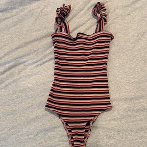 Small striped reformation thong body suit. Black blue pink red white